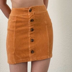 Blue Spice corduroy style mini skirt with buttons